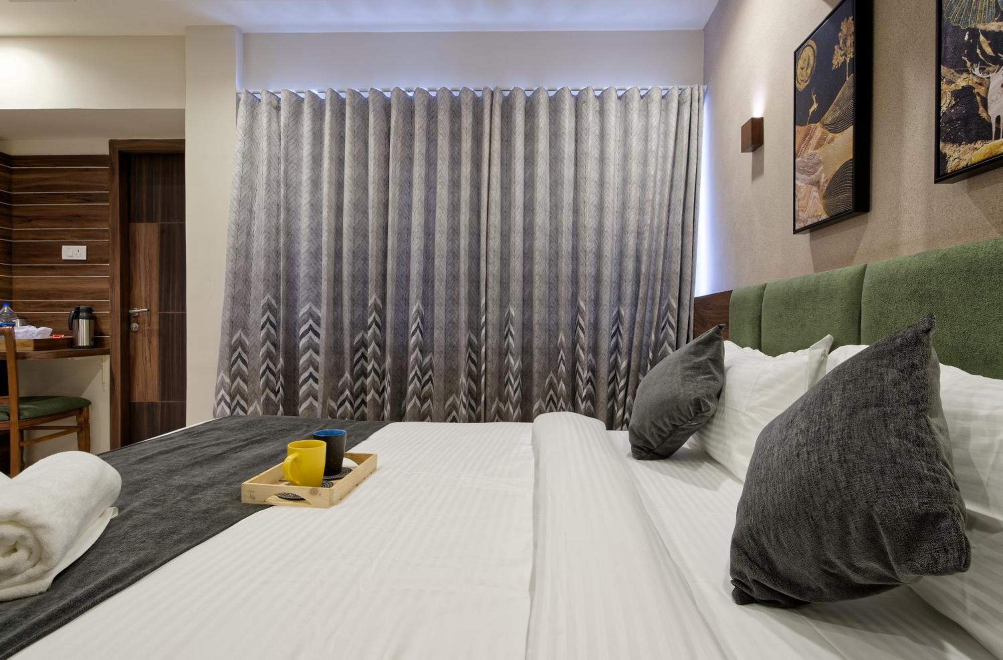 Exora Inn Ahmedabad Buitenkant foto
